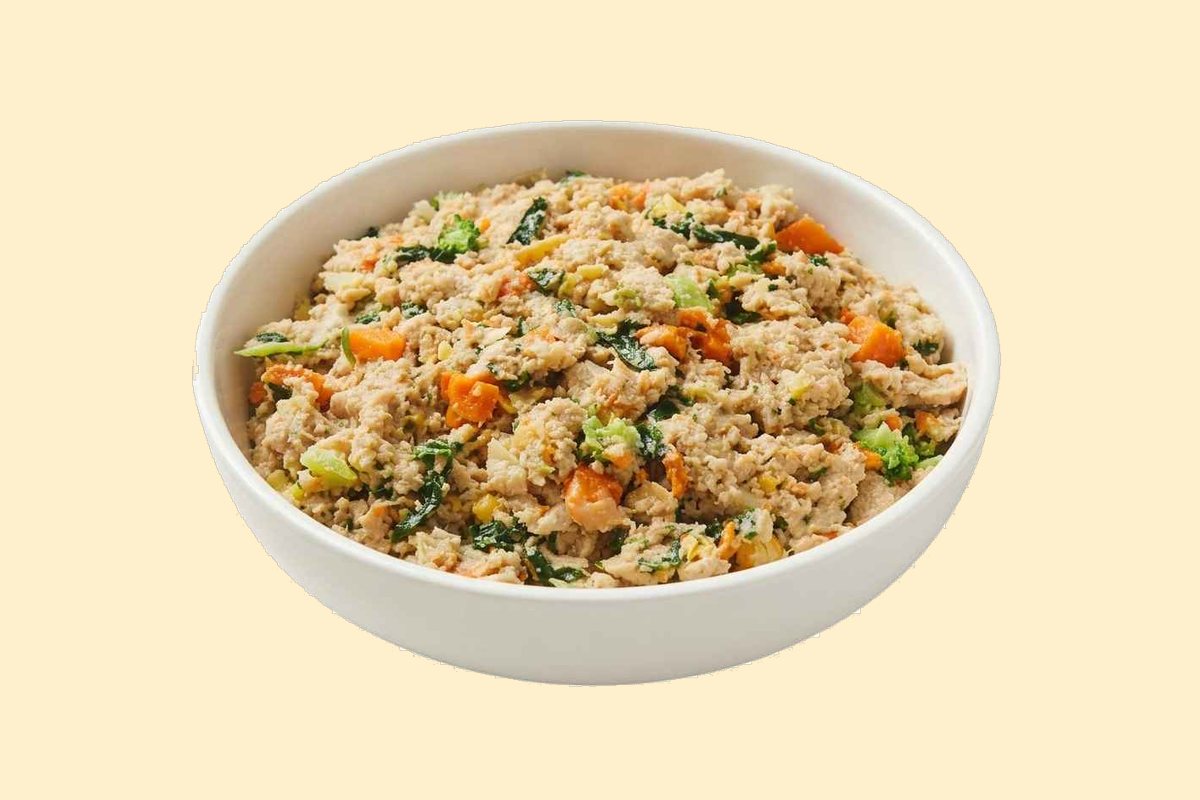 A bowl of cooked chicken thigh with butternut squash, broccoli, spinach and brown rice — a Teddy's Kitchen recipe